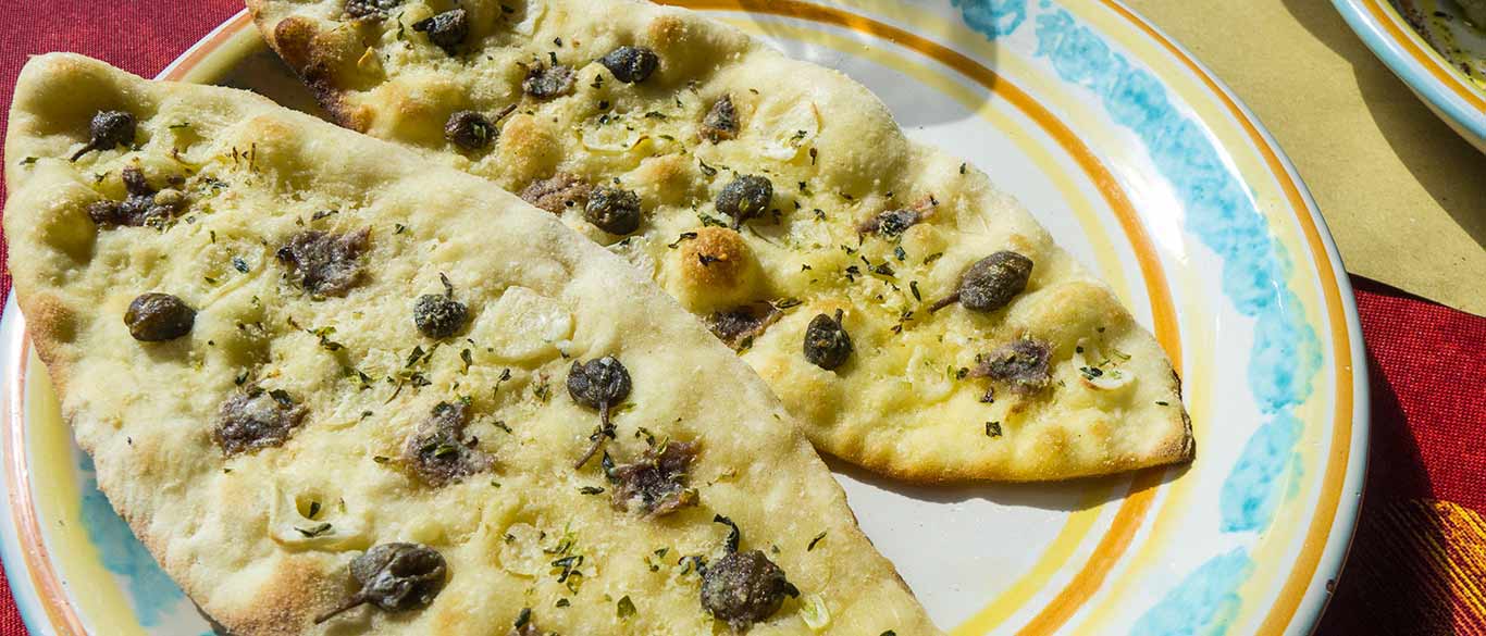 capers on flatbread
